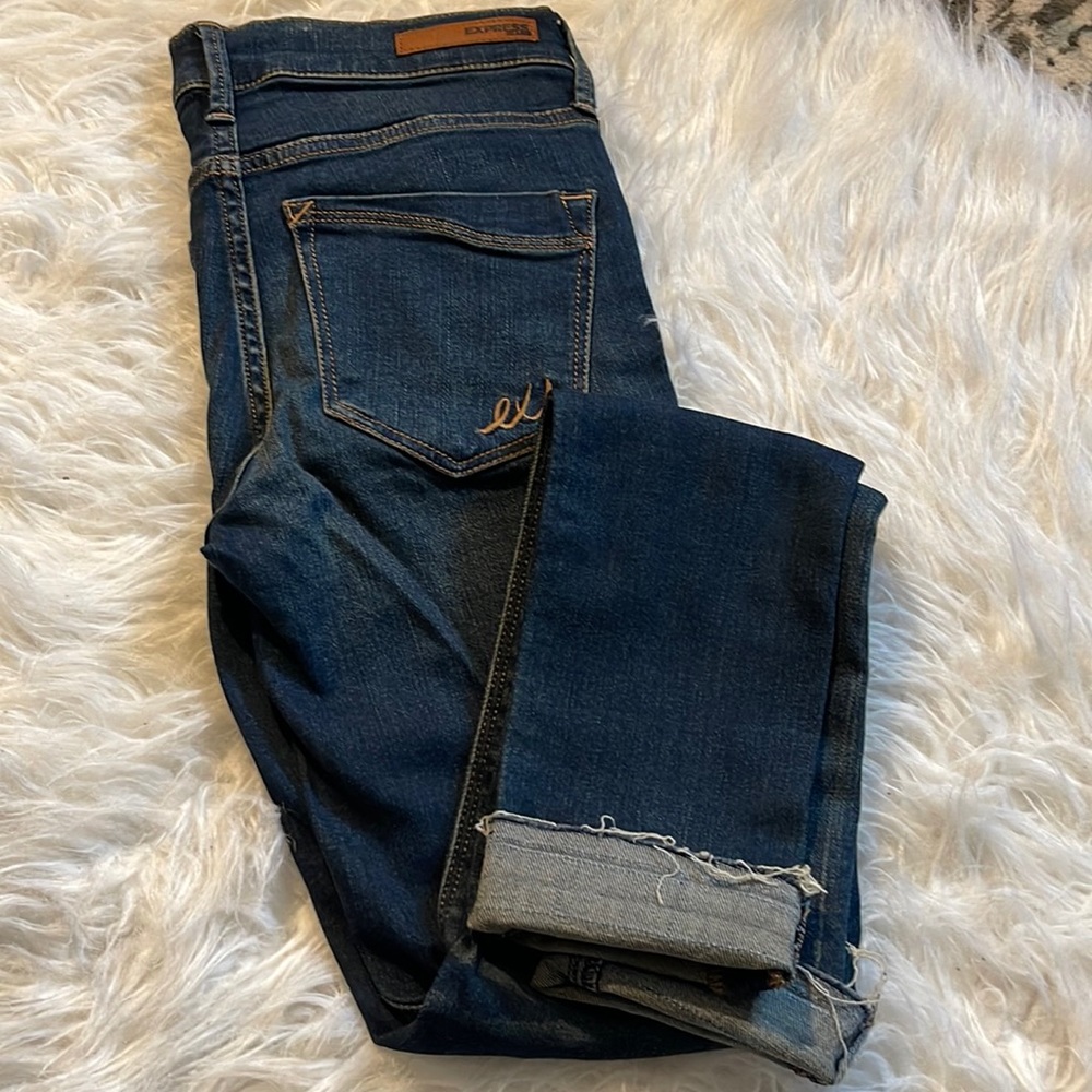 Size 00 Express Jeans Ultimate Stretch Leggings Mid Rise like new Distressed